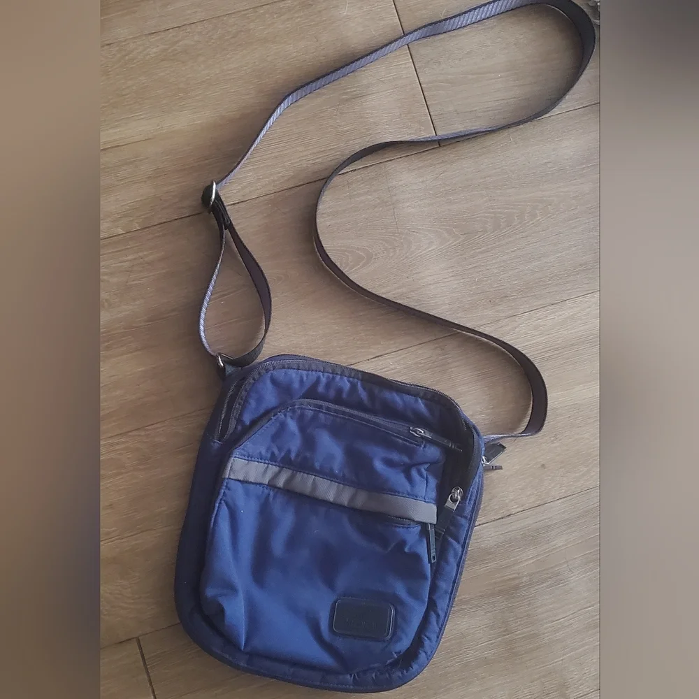 TUMI Navy Blue Organizer Travel Crossbody Bag.